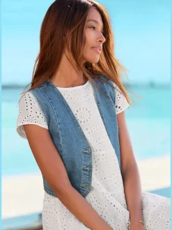 Gilet en jean à encolure V avec boutons dorés devant