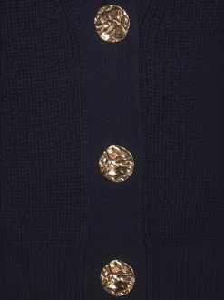 Gilet en tricot à col V profond avec boutons dorés et bords-côtes
