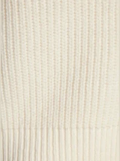 Gilet en tricot à col V profond avec boutons dorés et bords-côtes
