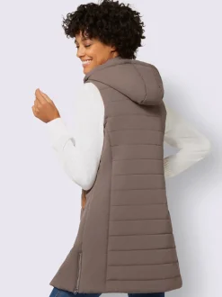 Gilet long matelassé avec col montant et capuche amovible