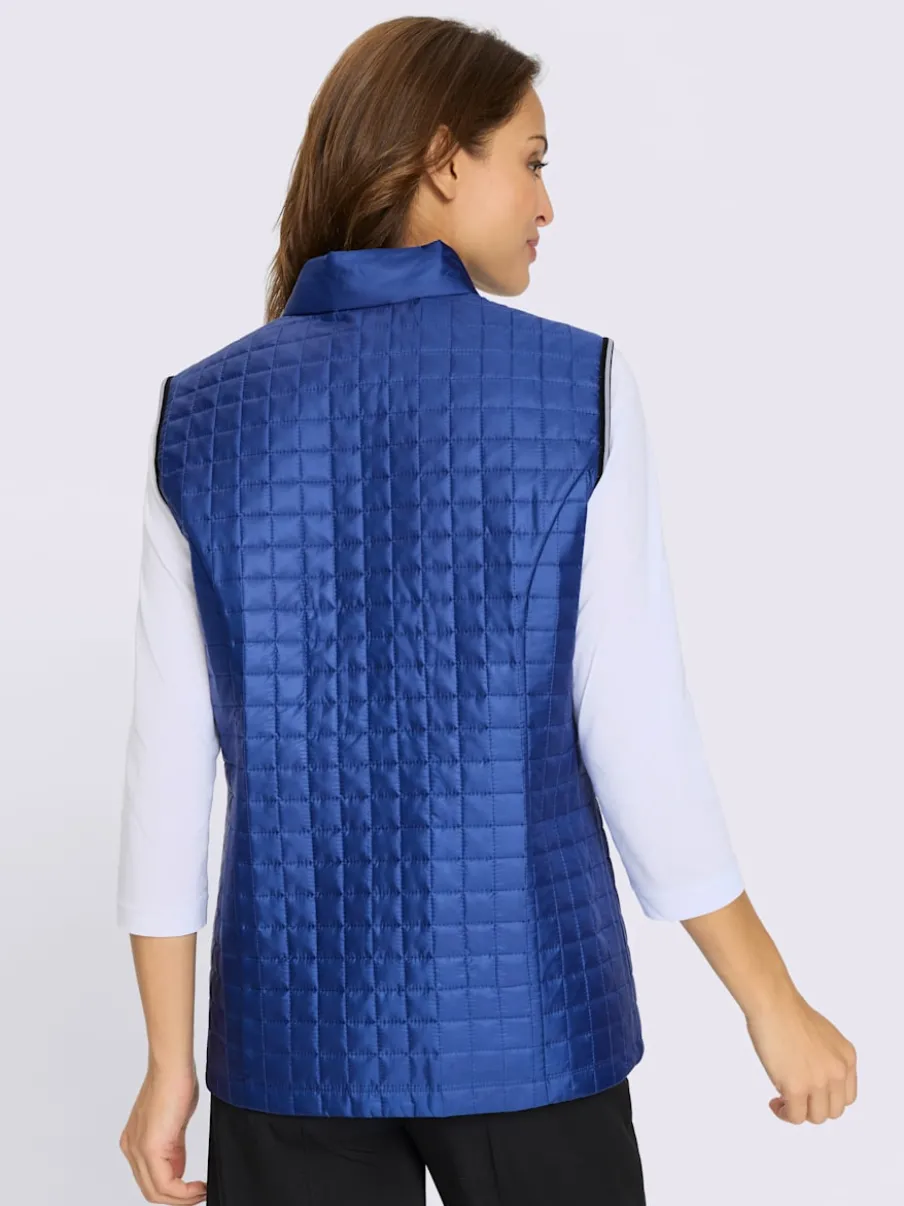 Gilet matelassé avec col montant et poches contrastées