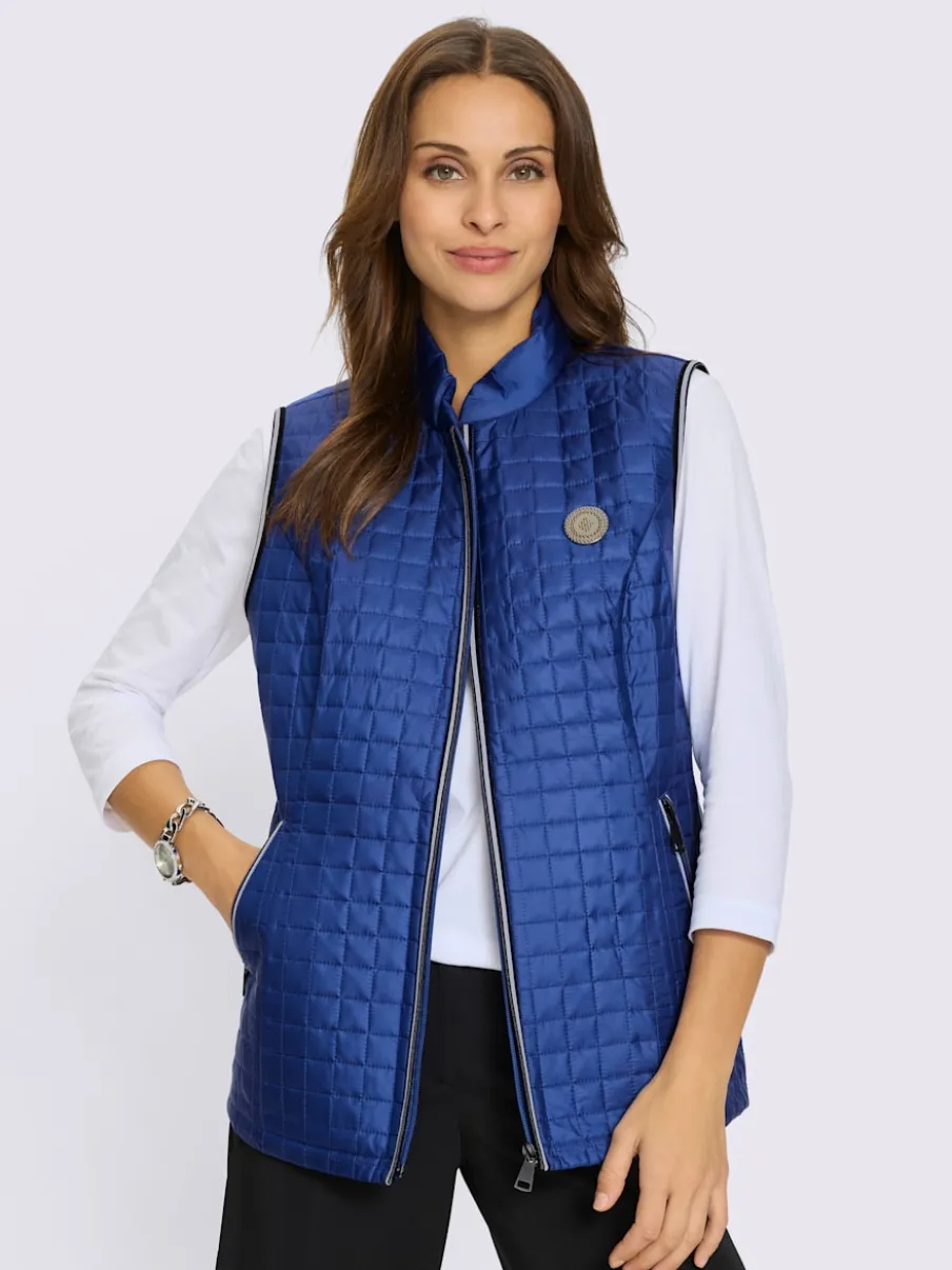 Gilet matelassé avec col montant et poches contrastées