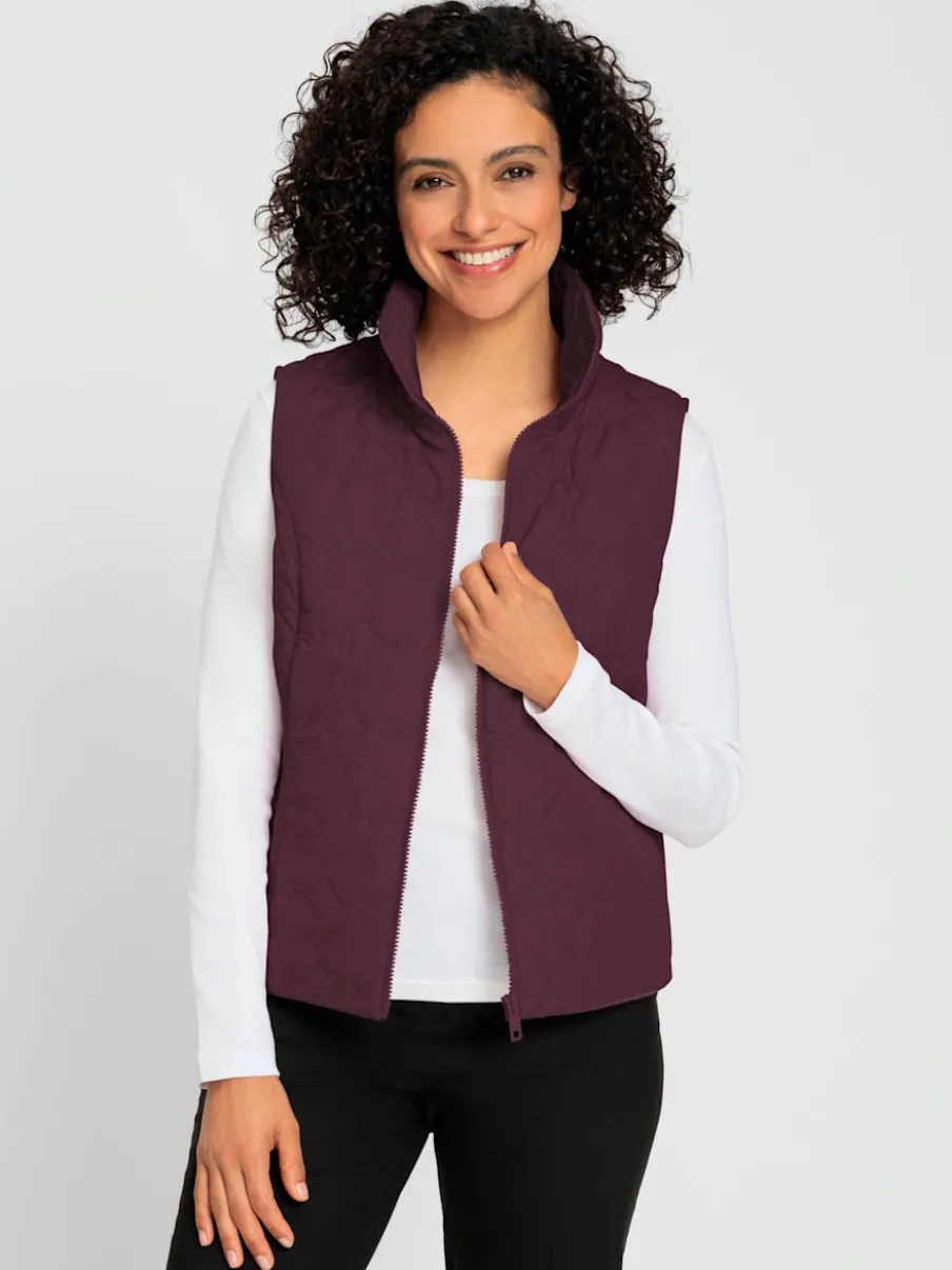 Gilets matelassés avec col montant et poches pratiques