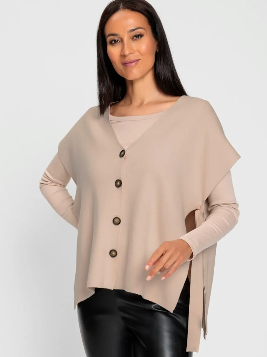 Gilet tricot ample encolure V avec liens noués