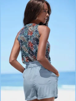 Haut de plage avec encolure américaine à motif fleuri