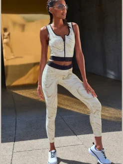 Hauts techniques courts avec glissière et ceinture élastique