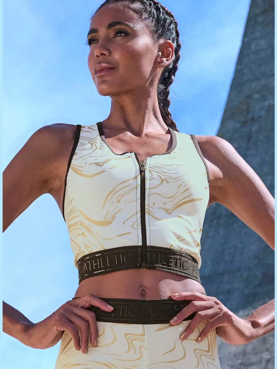 Hauts techniques courts avec glissière et ceinture élastique