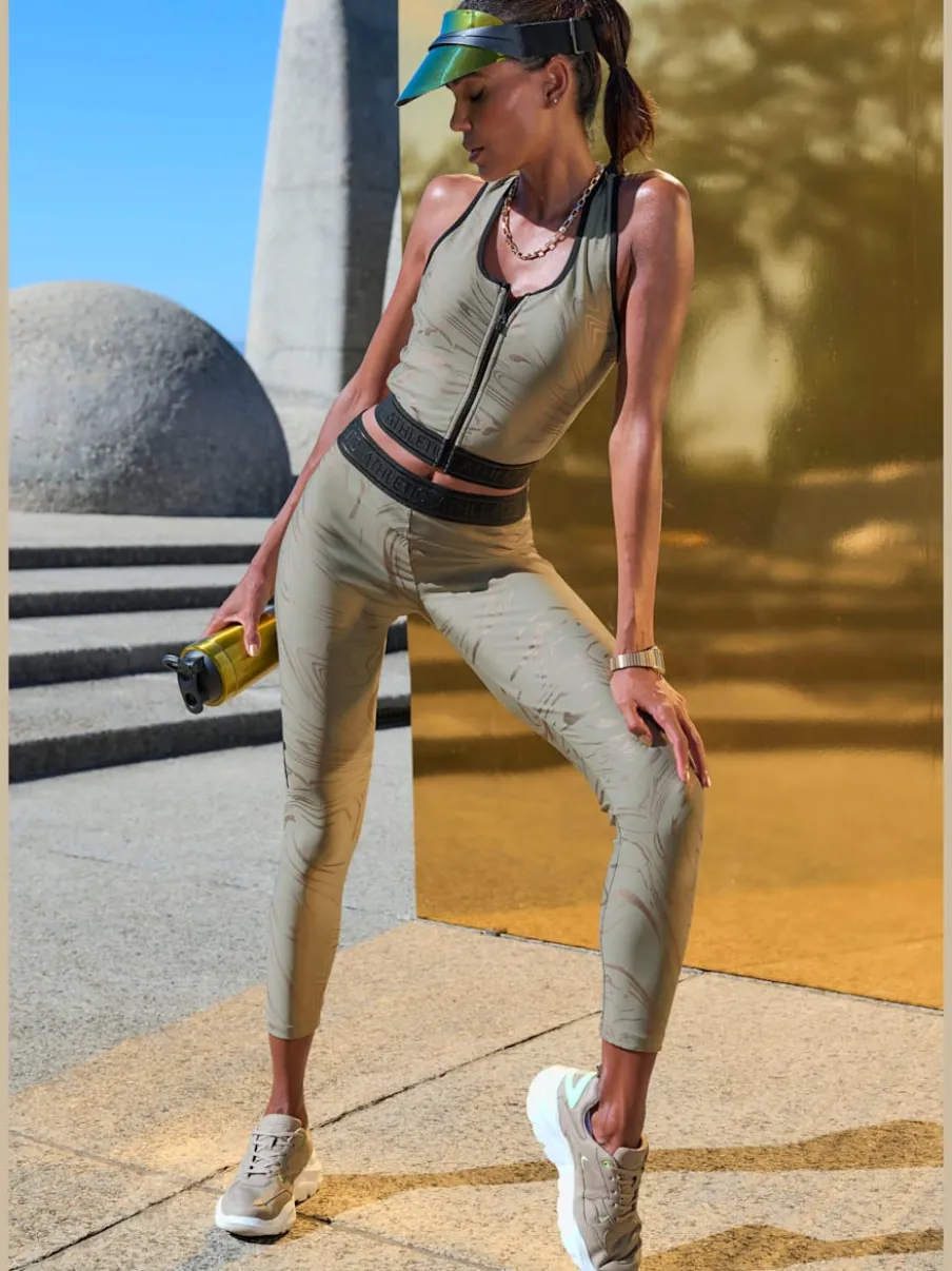 Hauts techniques courts avec glissière et ceinture élastique