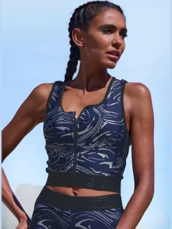 Hauts techniques courts avec glissière et ceinture élastique