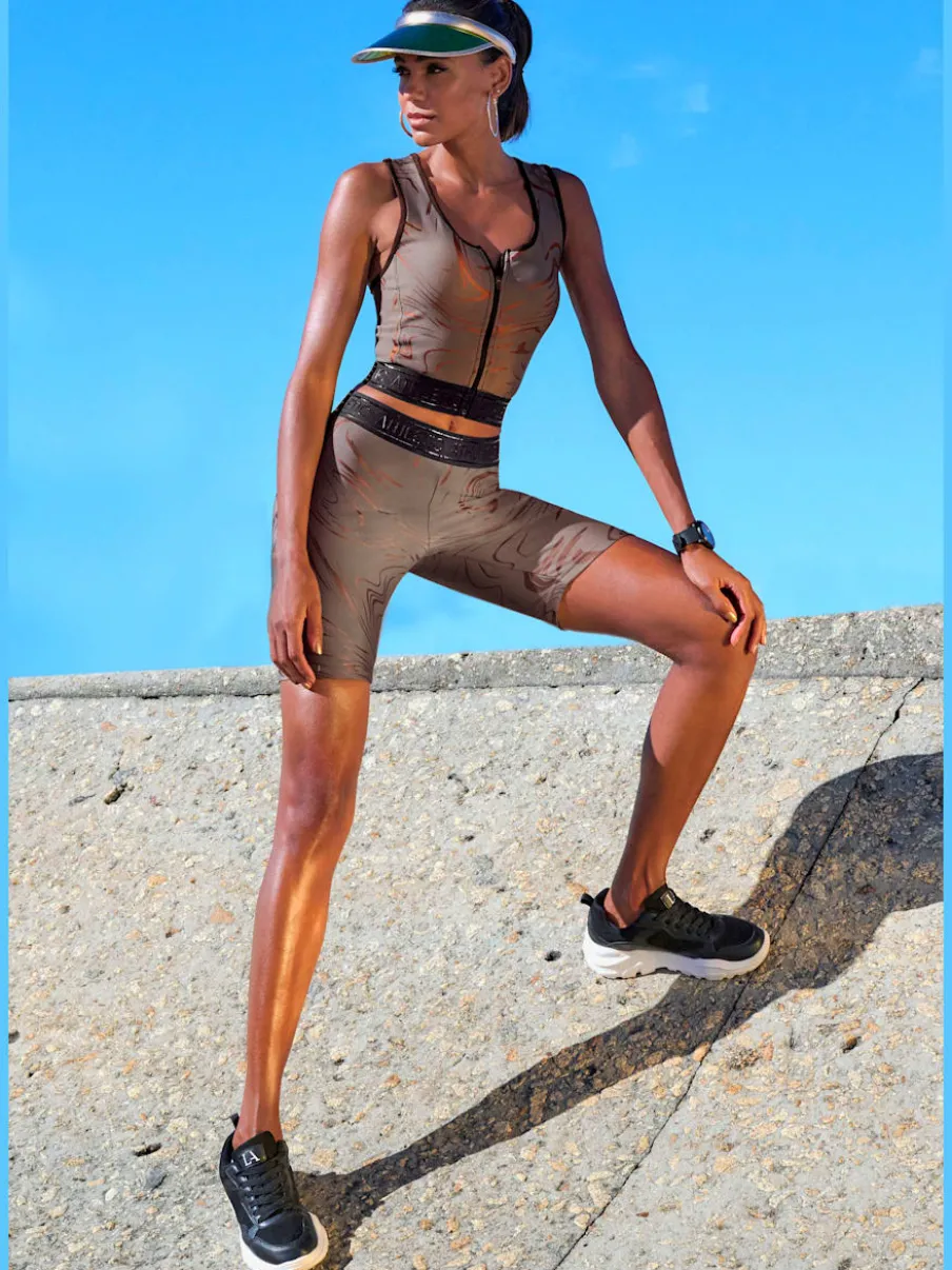 Hauts techniques courts avec glissière et ceinture élastique