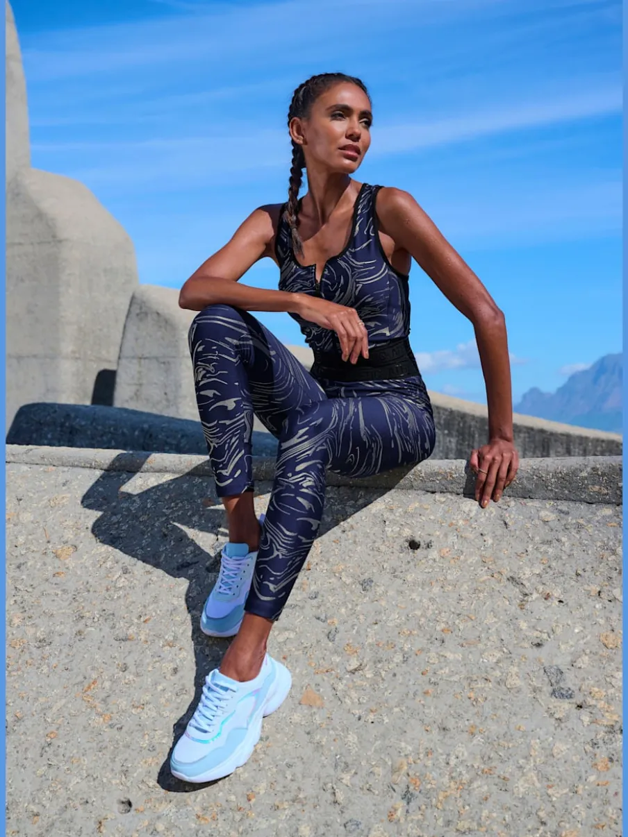 Hauts techniques courts avec glissière et ceinture élastique