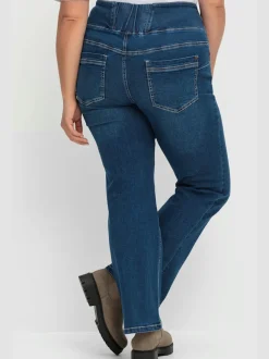 Jean bootcut pour les tailles fines avec des hanches marquées et un peu de ventre