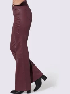 Jean bootcut revêtement brillant