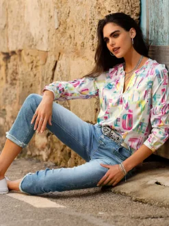 Jean boyfriend avec patte de boutonnage et franges