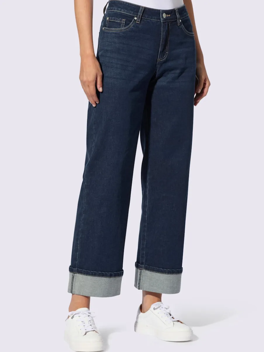 Jean cinq poches avec revers fixe jambes larges