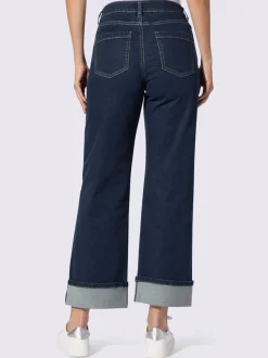 Jean cinq poches avec revers fixe jambes larges