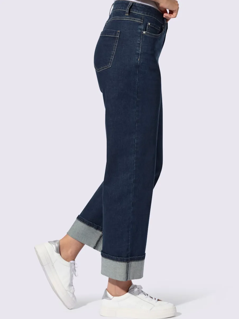 Jean cinq poches avec revers fixe jambes larges