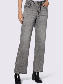 Jean coupe droite cinq poches avec rivets décoratifs