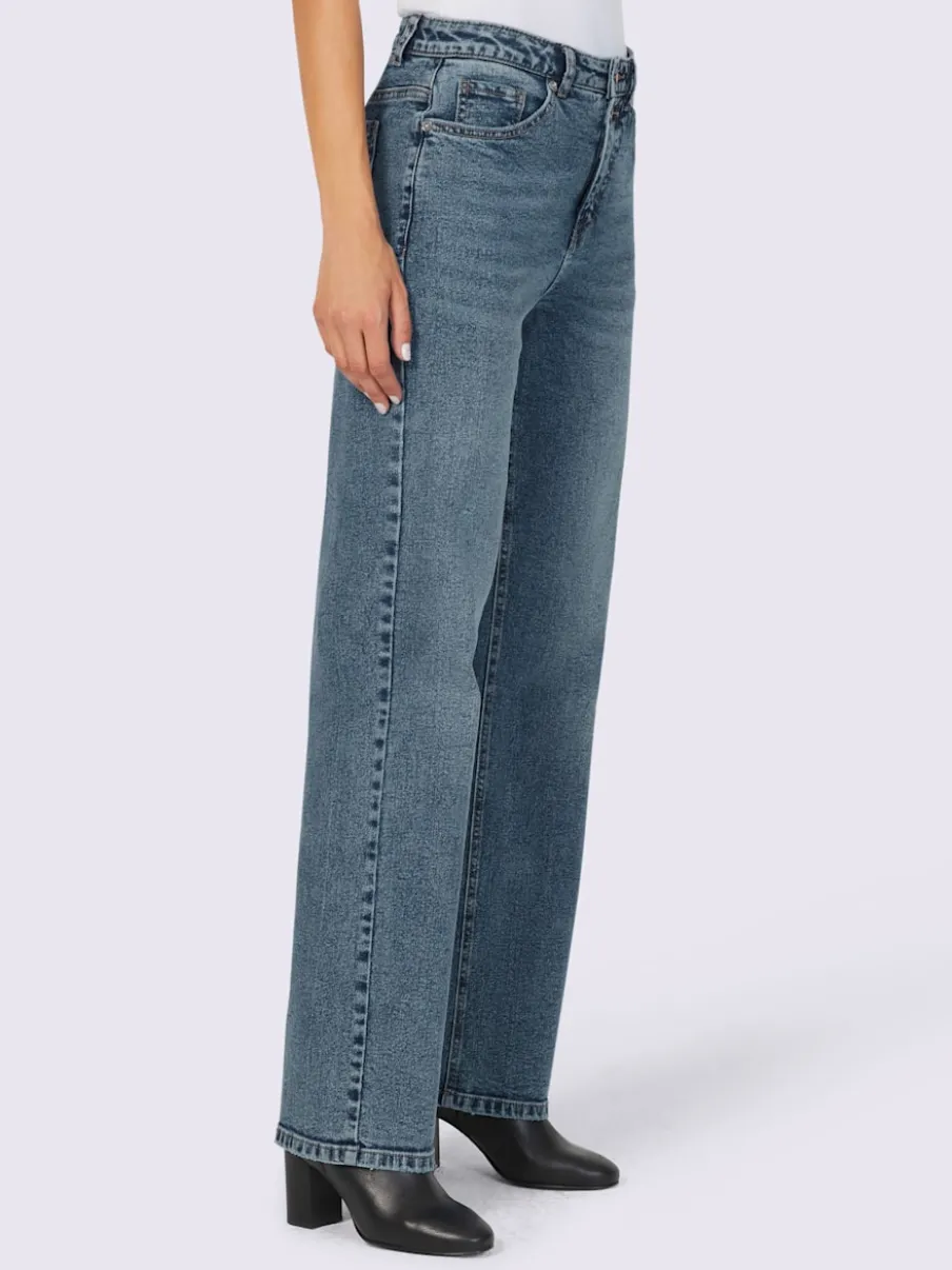 Jean coupe droite cinq poches avec rivets décoratifs
