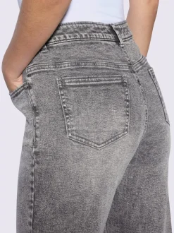 Jean coupe droite cinq poches avec rivets décoratifs