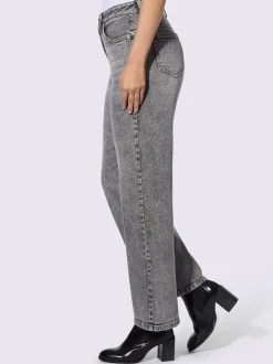 Jean coupe droite cinq poches avec rivets décoratifs