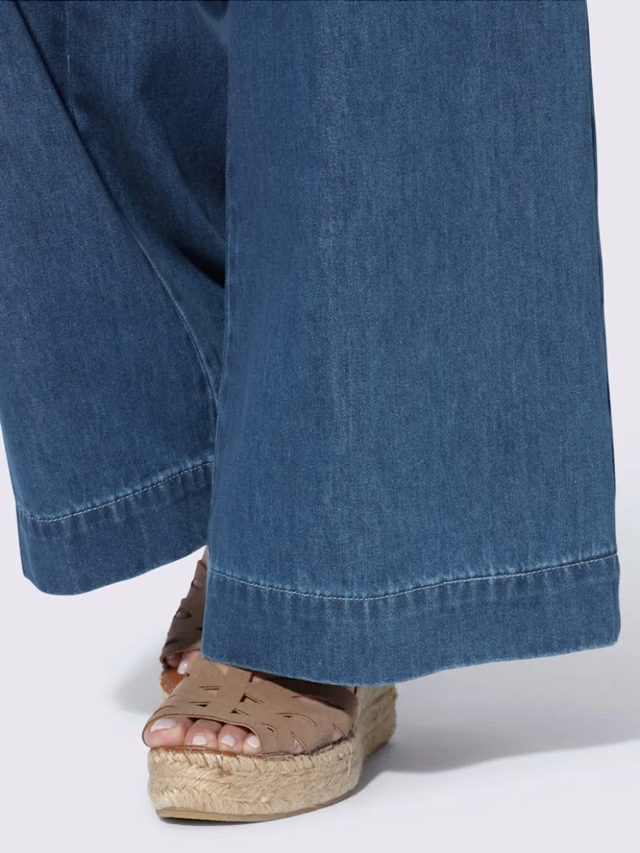 Jean coupe large avec poches devant et ourlet large