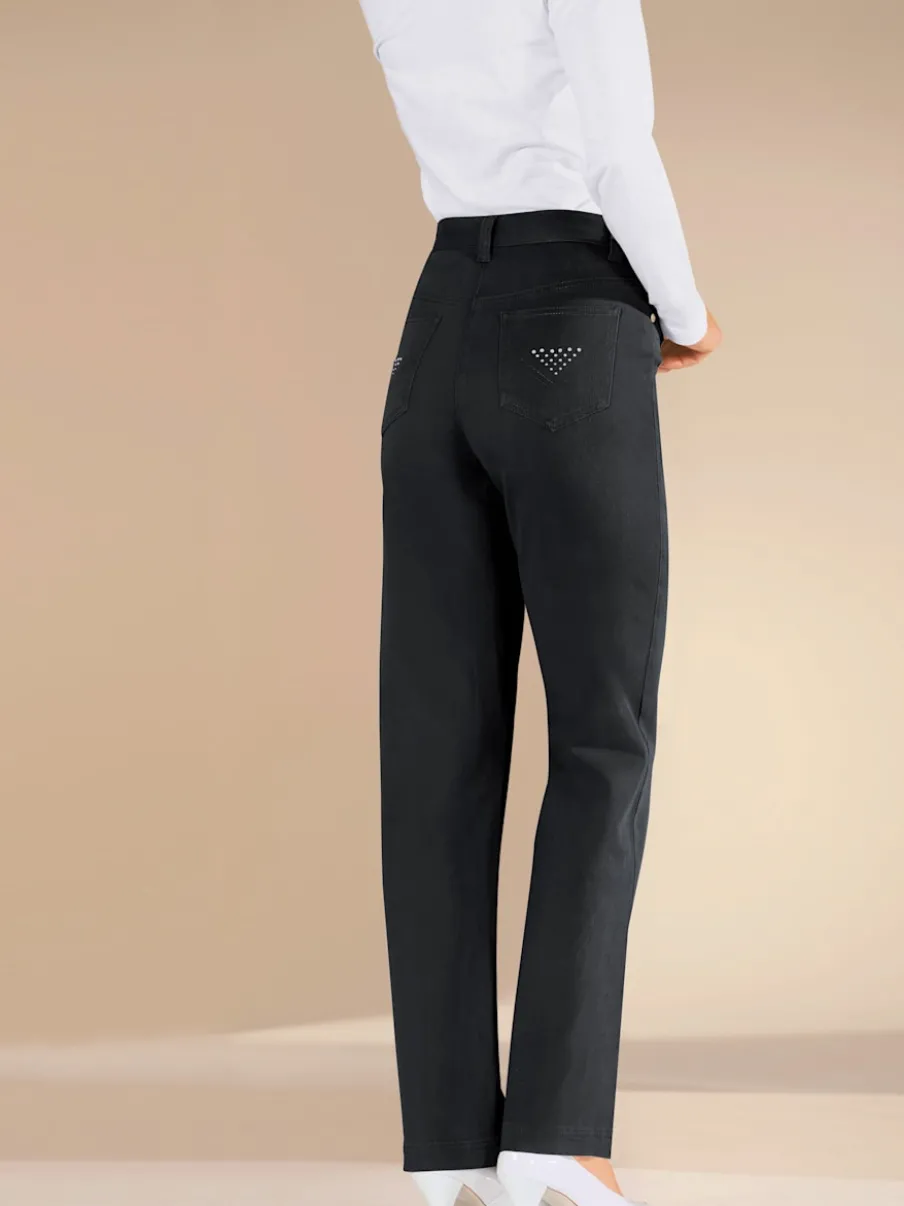Jean droit avec ceinture élastique poches arrière brillantes.