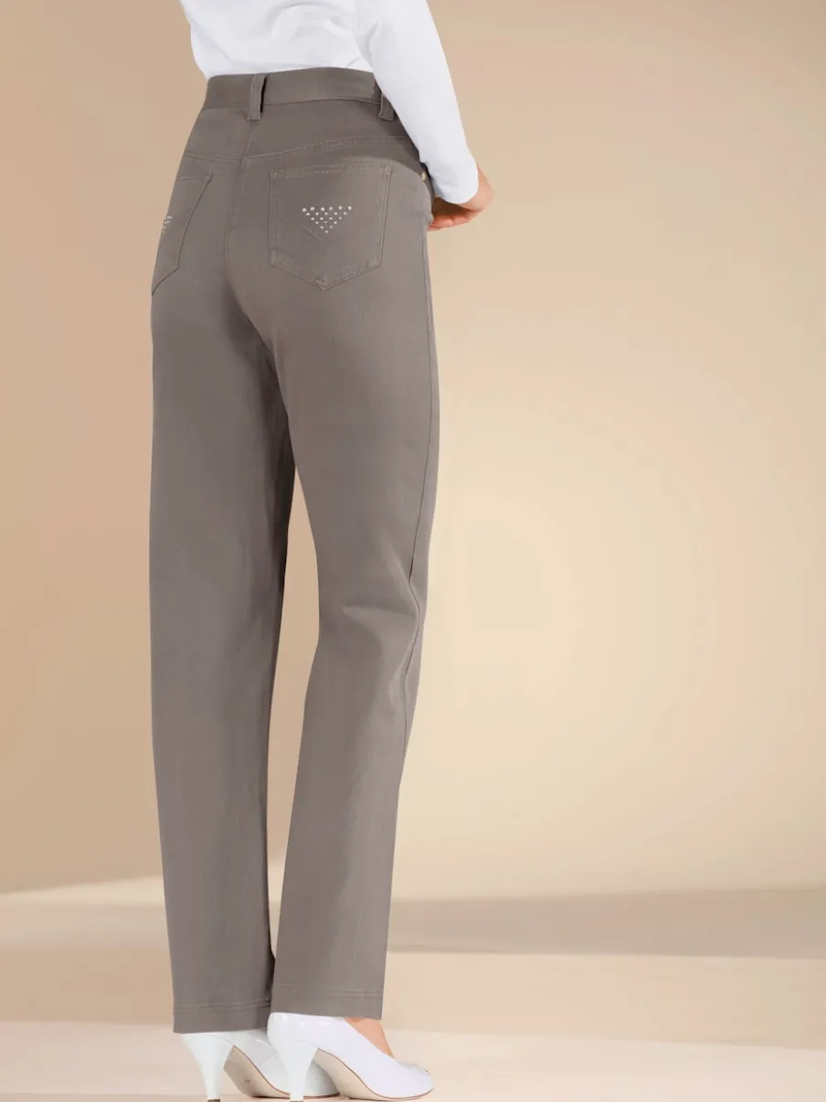 Jean droit avec ceinture élastique poches arrière brillantes.