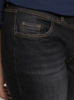 Jean droit empiècement en v pour un effet ventre plat