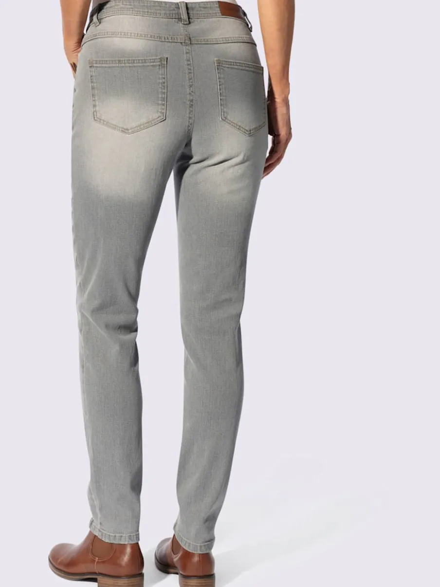 Jean effet délavé avec poches et ceinture gainante