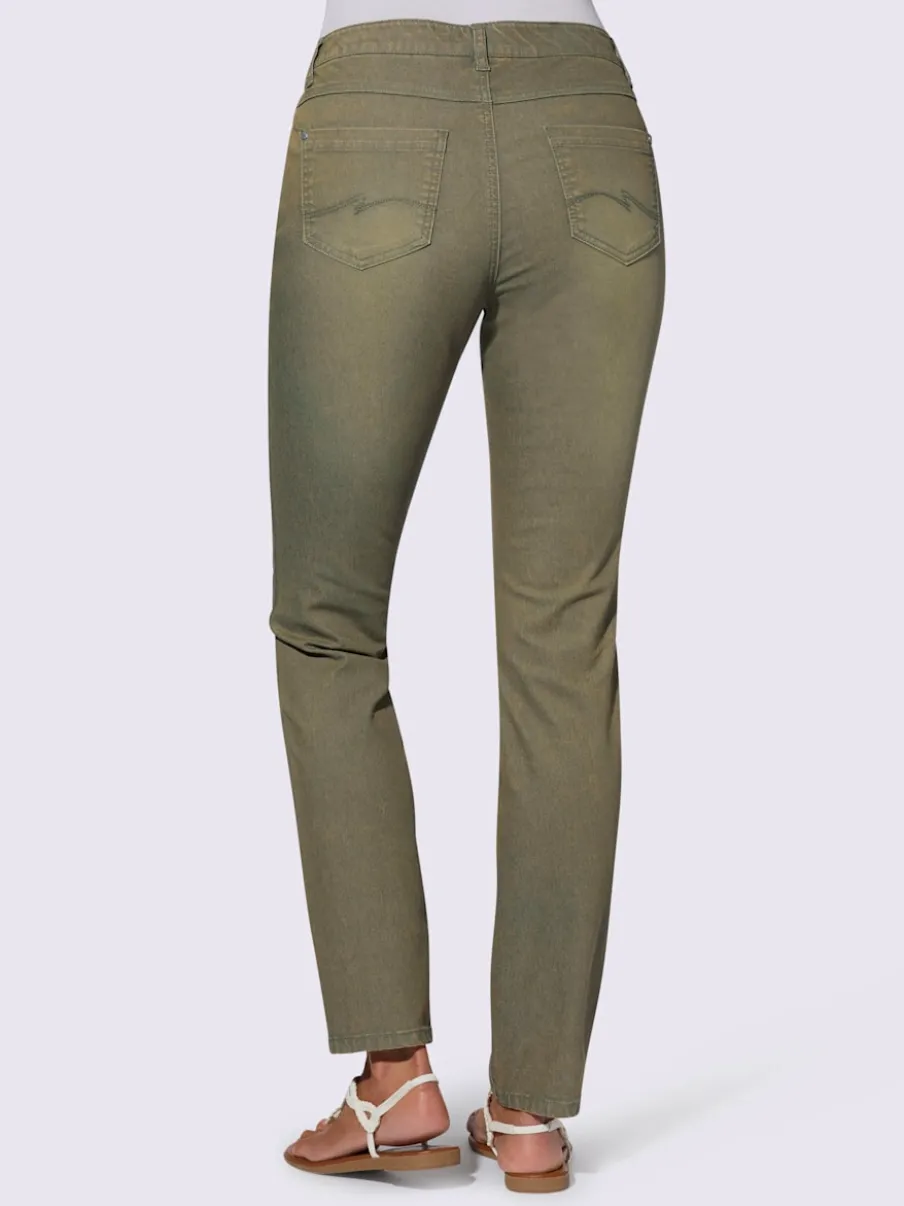 Jean extensible cinq poches avec rivets décoratifs arrière