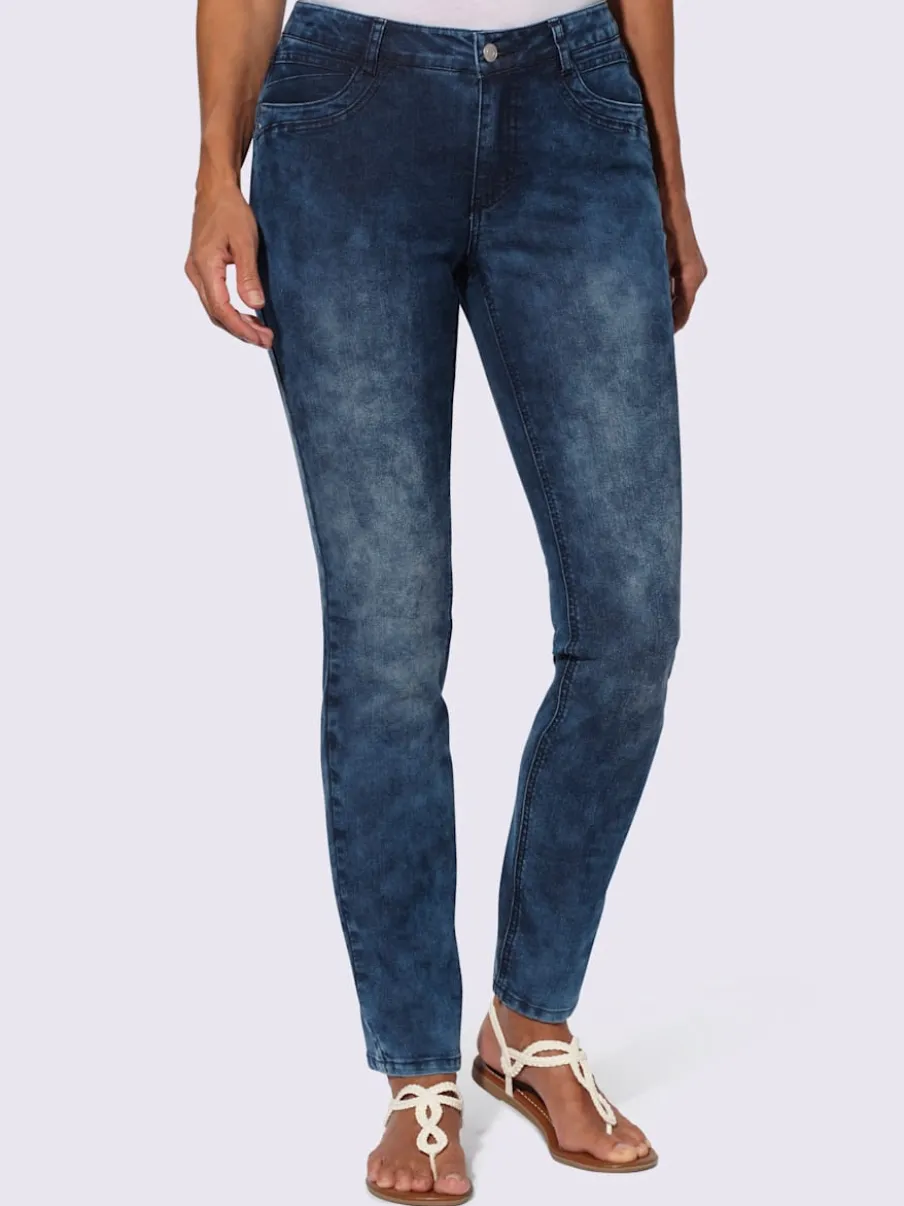 Jean extensible cinq poches avec rivets décoratifs arrière