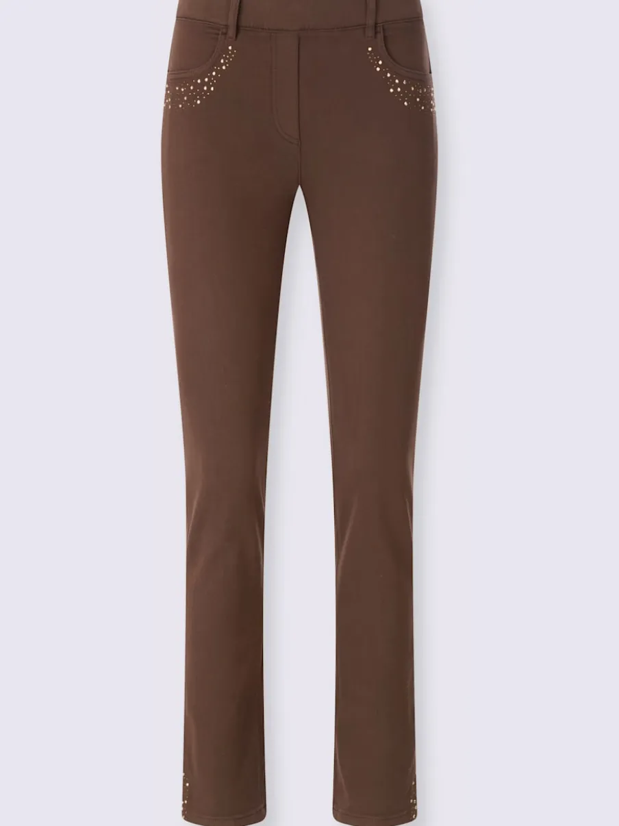 Jean extensible à fausse fermeture avec pierres brillantes et fente