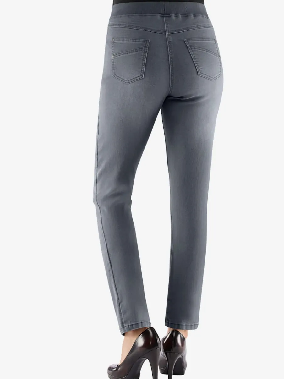 Jean facile à enfiler avec ceinture élastique intégrée.