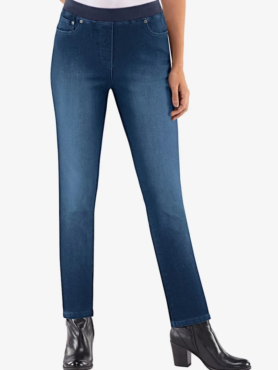 Jean facile à enfiler avec ceinture élastique intégrée.