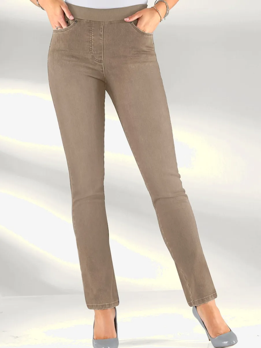 Jean facile à enfiler avec ceinture élastique intégrée.