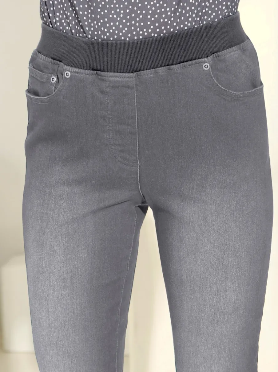 Jean facile à enfiler avec ceinture élastique intégrée.