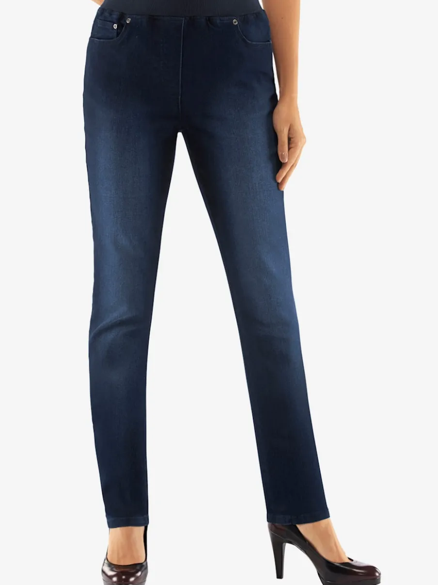 Jean facile à enfiler avec ceinture élastique intégrée.