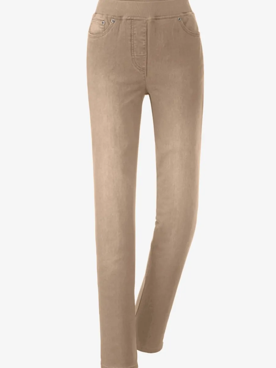 Jean facile à enfiler avec ceinture élastique intégrée.