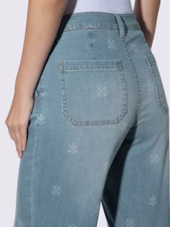 Jean à jambes larges avec imprimé floral et poches