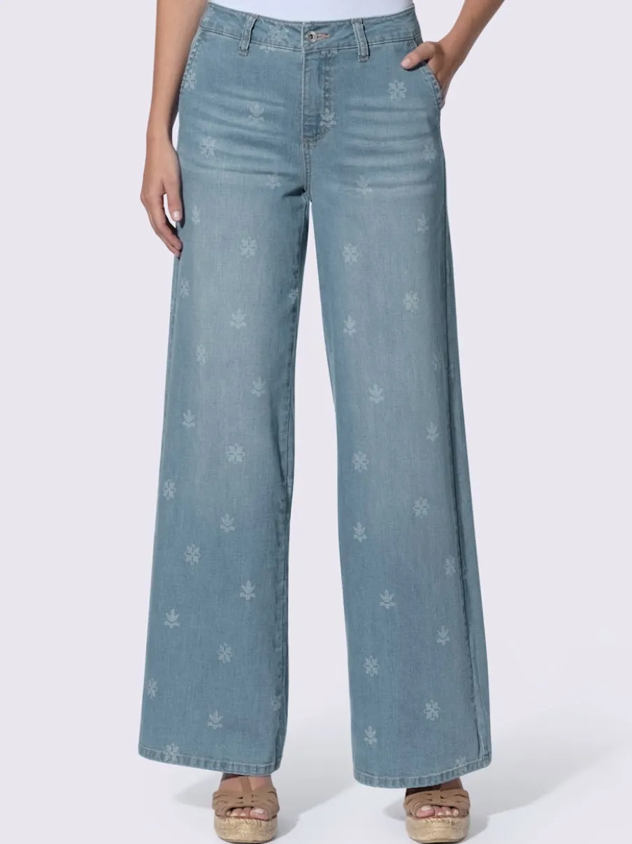 Jean à jambes larges avec imprimé floral et poches