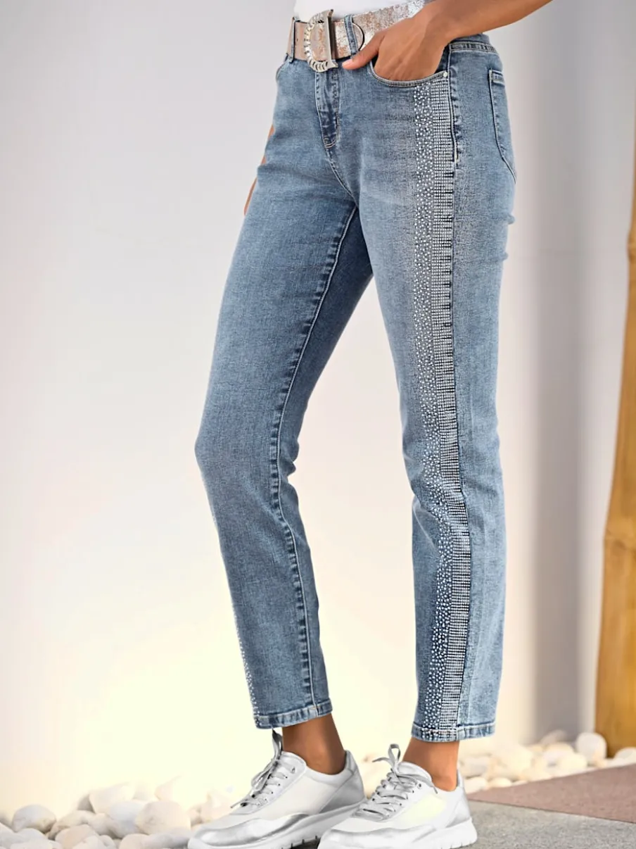 Jean 5 poches avec pierres brillantes et effet délavé