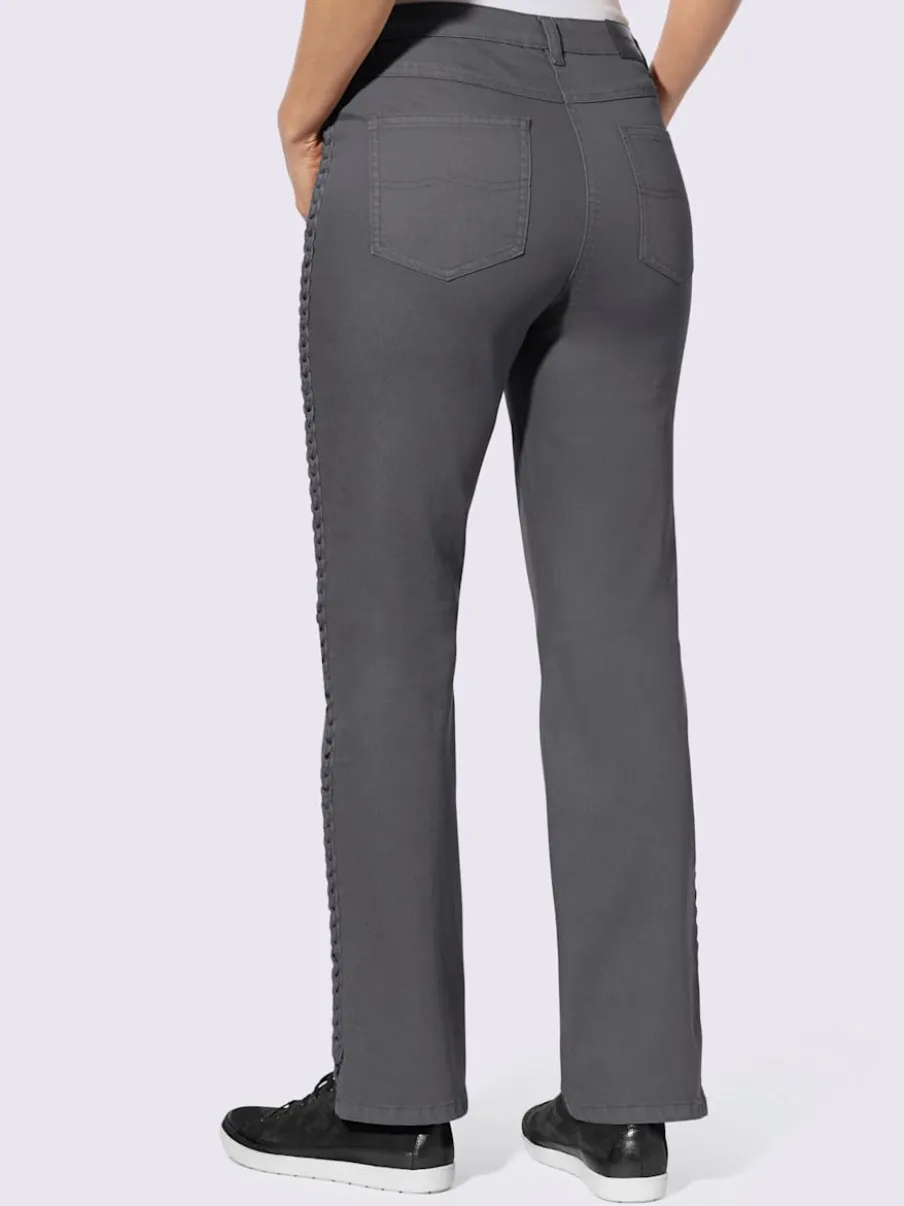 Jean 5 poches avec tressage sur les coutures latérales