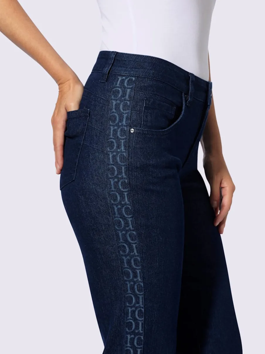 Jean push-up cinq poches avec rayures sur les côtés