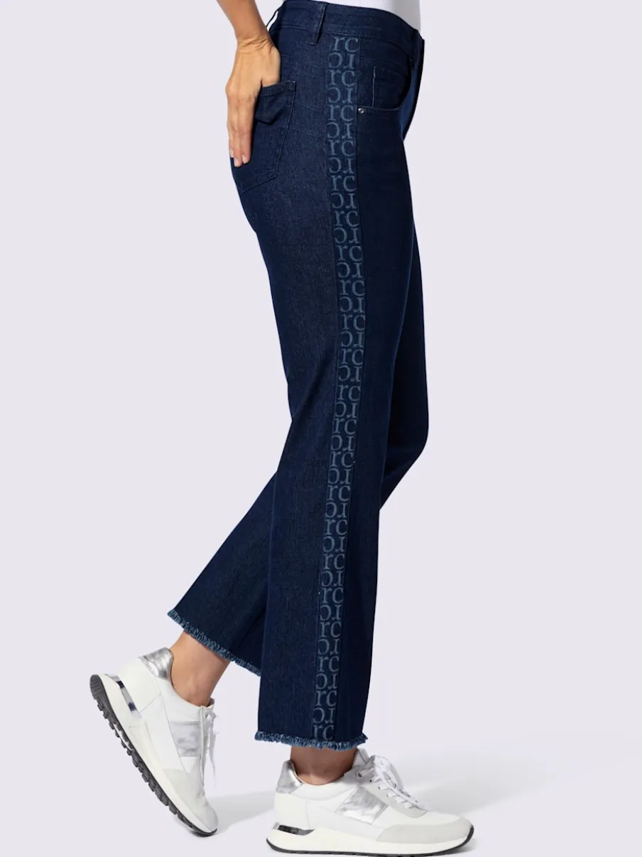 Jean push-up cinq poches avec rayures sur les côtés