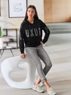 Jean 7/8 à revers fixe avec cinq poches extensibles