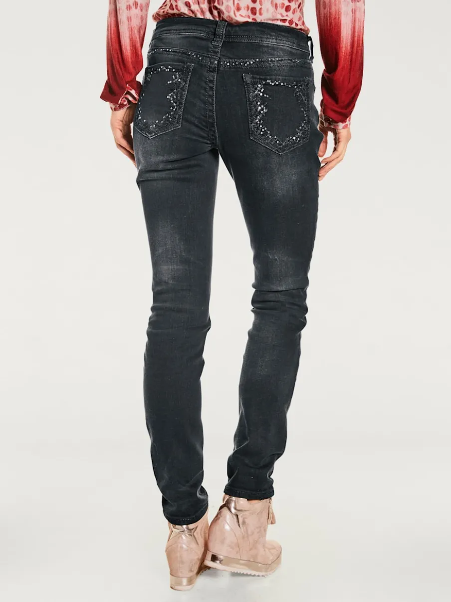 Jean skinny avec broderie et effet ventre plat