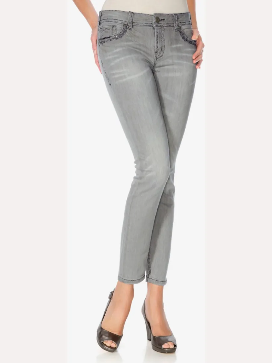 Jean skinny avec broderie et effet ventre plat