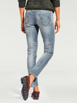 Jean skinny avec broderie et effet ventre plat