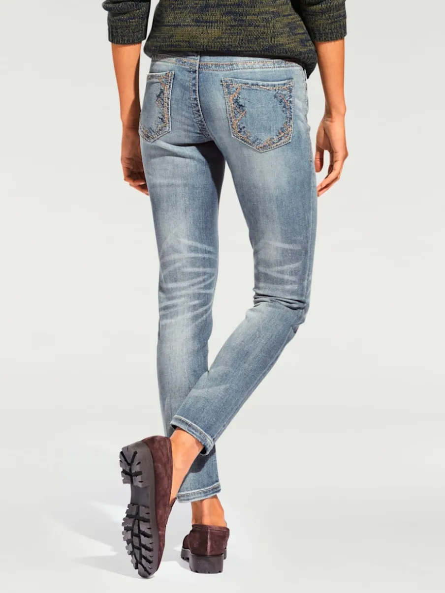 Jean skinny avec broderie et effet ventre plat